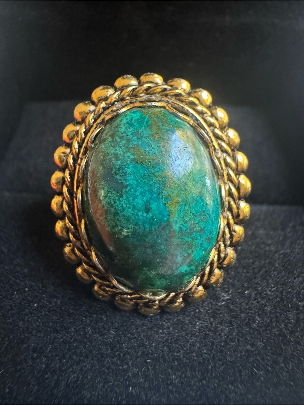 Vintage Gold tone ring with a green polished likely malachite cabachon size 7